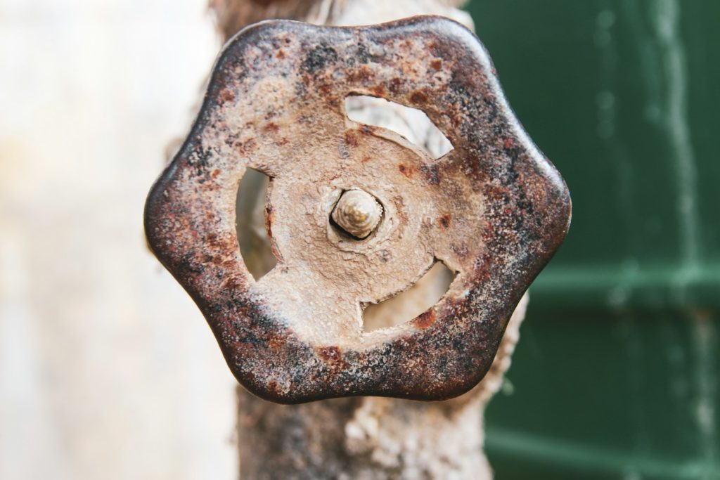 Photo by Glen Carrie brown metal door handle in close up photography